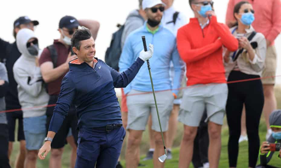 Rory McIlroy struggling in the wind on day two.