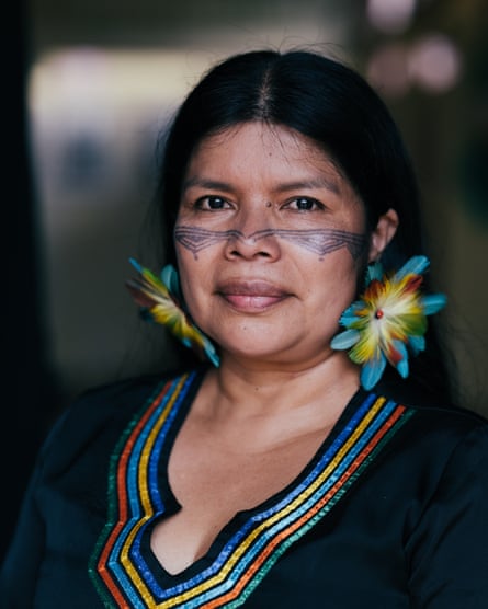 An Indigenous Amazonian woman with a tattoo on her face