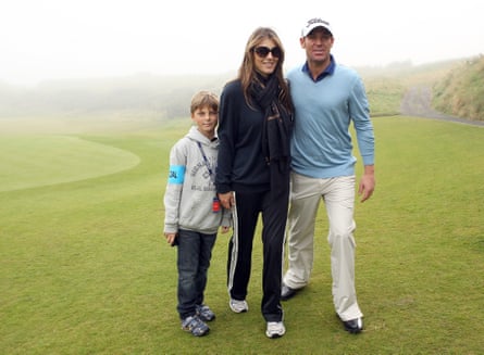 Damian, aged 9, with Elizabeth and Shane Warne.