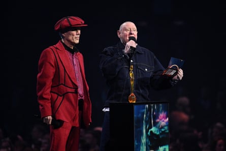 Bez (left) and Shaun Ryder present the award for group of the year.