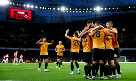 Wolves celebrate their equaliser at the Emirates.