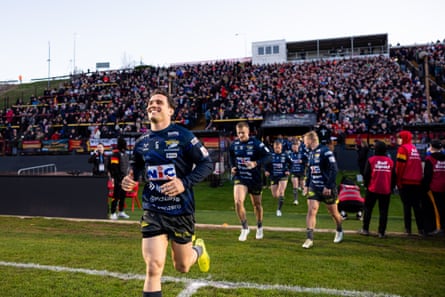 Leeds run out before their match against Bradford at Odsal