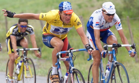 Lance Armstrong  gestures as he rides alongside Alex Zulle on the way to Pau in 1999