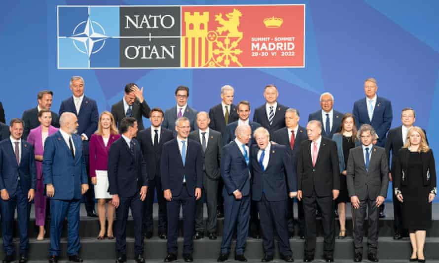 Nato leaders pose for family photo during summit in Madrid.