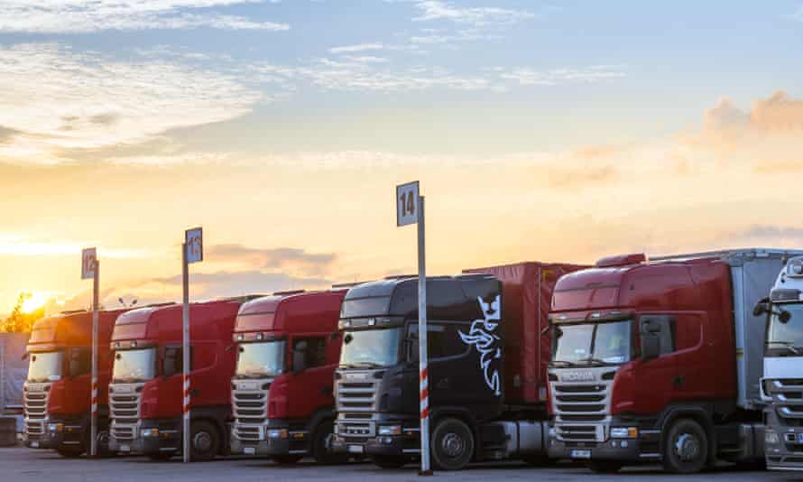 row of massive red trucks