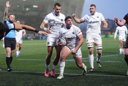 Dan Frost celebrates scoring a try