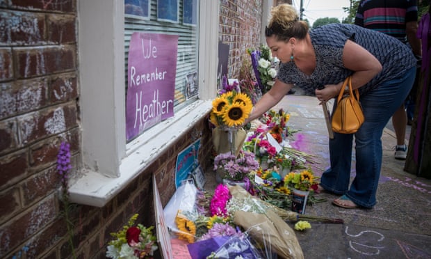 Mourners lay flowers at the memorial for Heather Heyer in downtown Charlottesville, Virginia.