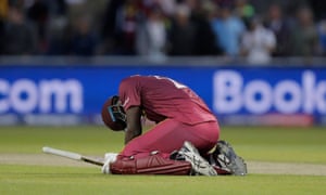 West Indies’ Carlos Brathwaite looks dejected after his swing for six runs to win the game was caught by Trent Boult.