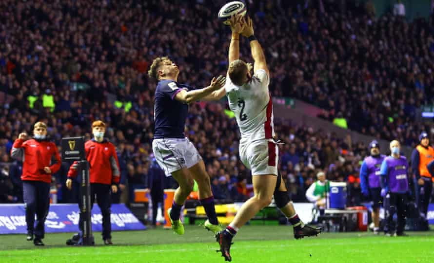 England's Luke Cowan-Dickie commits a deliberate knock on leading to a yellow card and a penalty try for Scotland