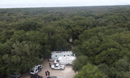 Law enforcement officials conduct a search of the vast Carlton reserve in the Sarasota, Florida, area for Brian Laundrie on Saturday.