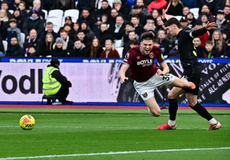 Sunderland's Trai Hume fouls West Ham United's Oliver Scarles to concede a penalty.