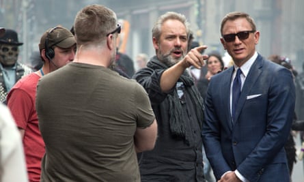 Mendes with Daniel Craig on the set of 2015’s Spectre.