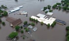 Floods drive people from homes in Iowa as much of US swelters in extreme heat