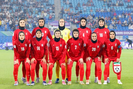 Iran‘s soccer team pose for a group photo before the Women’s Asian Cup Australia match between Iran and the Philippines on the Gold Coast on 8 March.