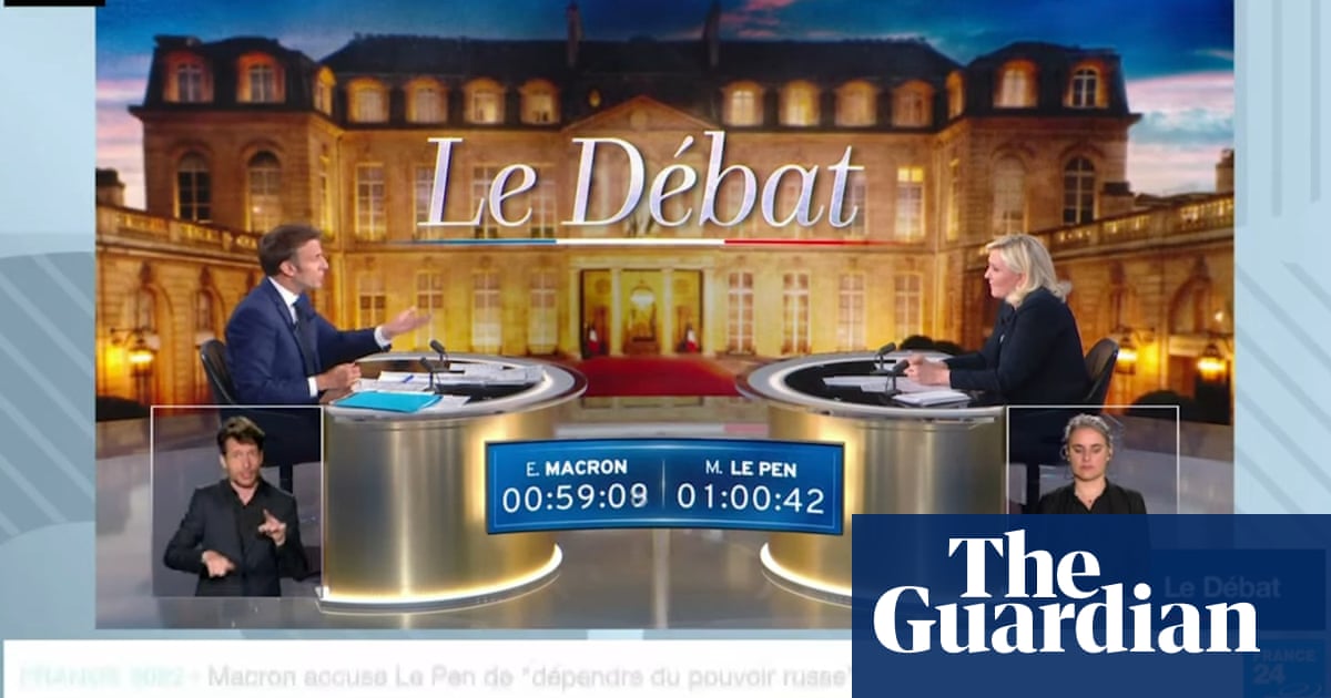 Marine Le Pen says she would ban the hijab during French presidential debate – video