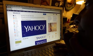 Man looking at Yahoo homepage
