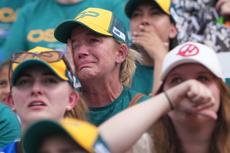 Devastated fans in the stands after Piastri’s crash.