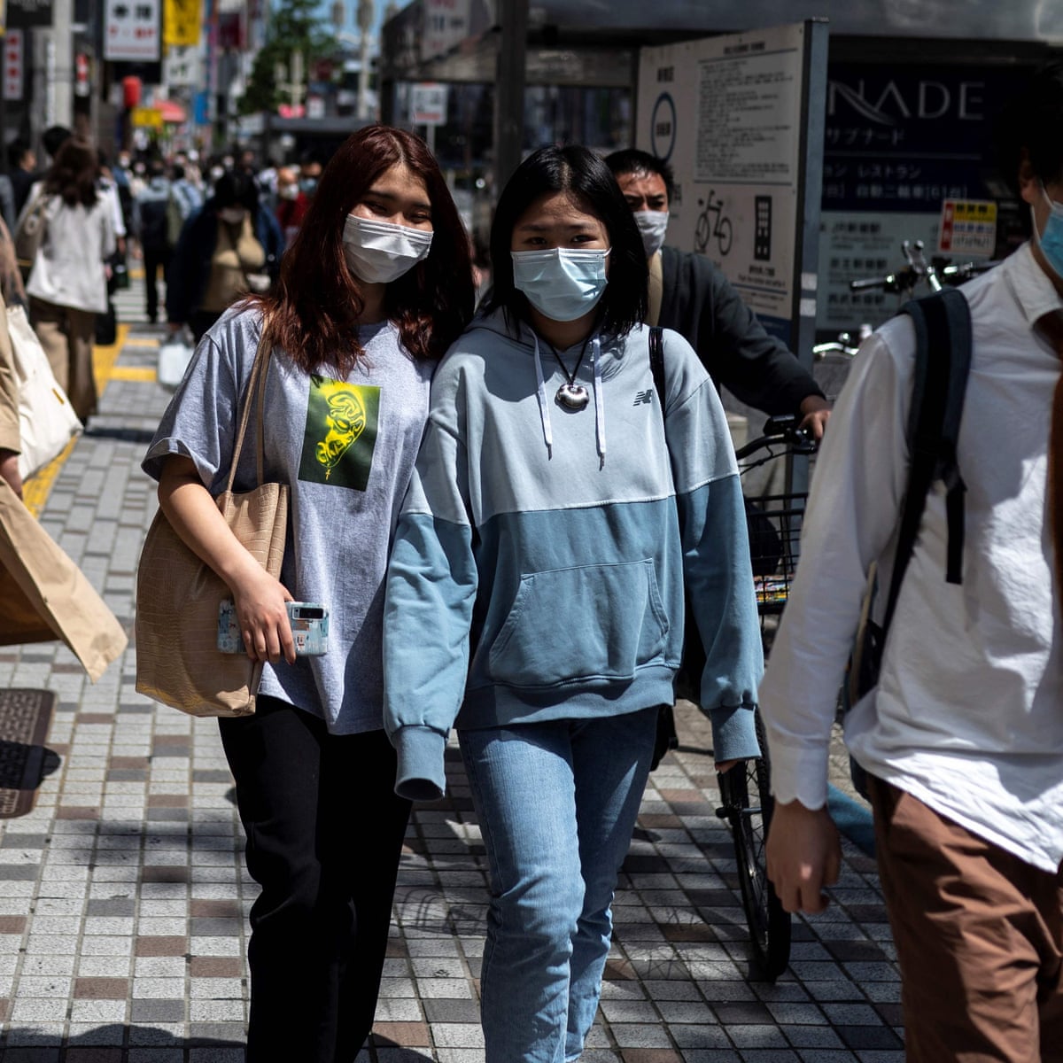 Japan Declares Targeted State Of Emergency As Covid Cases Surge Japan The Guardian