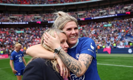 Chelsea manager Emma Hayes is embraced by Millie Bright after victory in the Cup final
