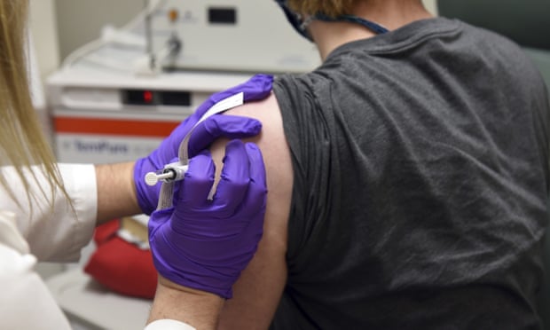 The first patient enrolled in Pfizer’s Covid-19 vaccine clinical trial at the University of Maryland School of Medicine in Baltimore, receives an injection, on 4 May.