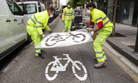 Workers create a bike lane in Cantabria, Spain.