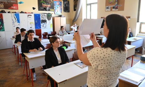 Pupils sit exams at a school in Budapest