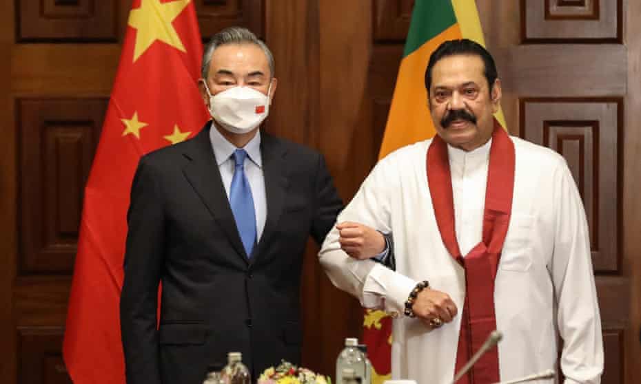Chinese foreign minister Wang Yi is visiting Sri Lanka, pictured here with prime minister Mahinda Rajapaksa.