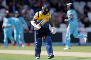 Kusal Perera leaves the pitch after being fired.