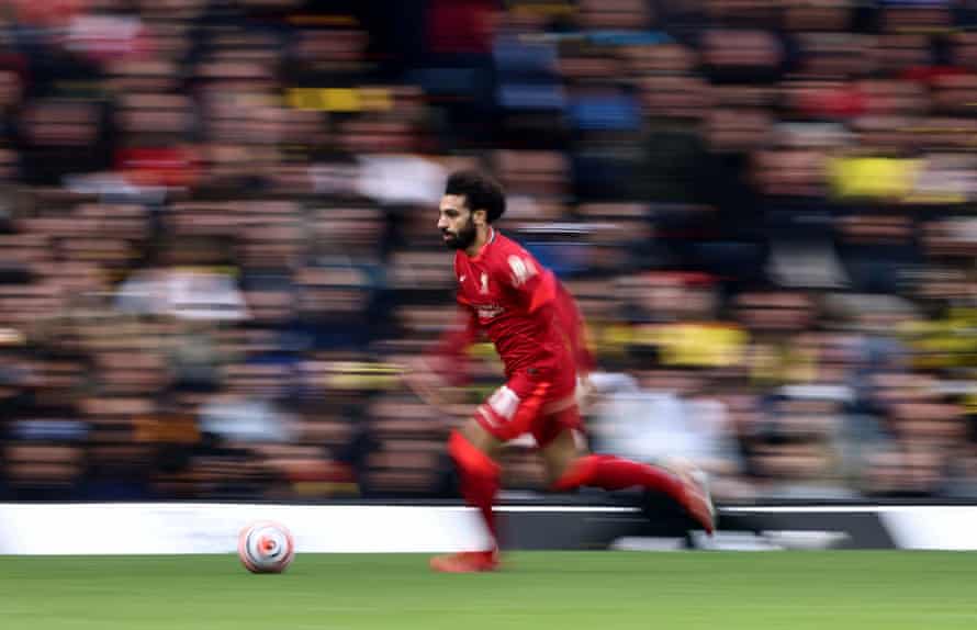 Liverpool’s Mohamed Salah surges forward against Watford.