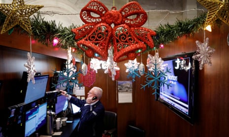 A trader works at his stall on the floor at the NYSE in New York.