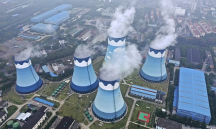 Steam billows out of the cooling towers at a coal-fired power station in Nanjing in east China’s Jiangsu province.