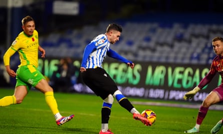 Sheffield Wednesday’s Josh Windass scores his side’s opening goal