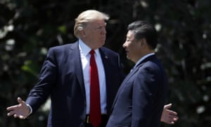 Donald Trump and Xi Jinping walking together in Florida in April.