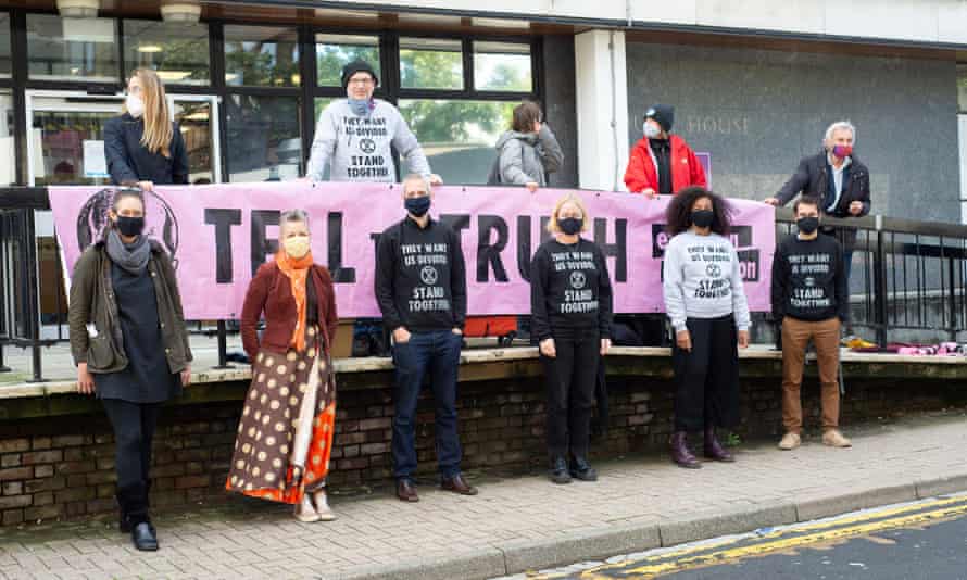 Extinction Rebellion protesters (bottom, left to right) Charlotte Kirin, Hazel Stenson, Caspar Hughes, Laura Frandsen, Elise Yarde and Amir Jones outside St Albans magistrates court.