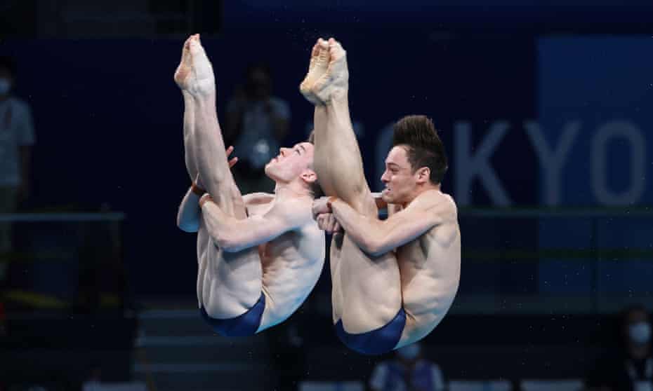 Matty Lee (left) and Tom Daley on their way to gold in the synchronised 10m platform diving.