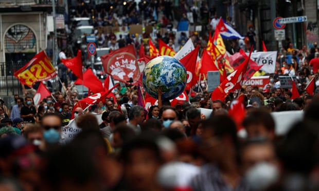 Protesters demand climate action as G20 ministers meet in Naples.