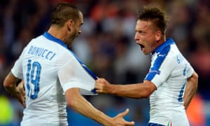 Emanuele Giaccherini celebrates with Leonardo Bonucci after scoring Italy’s opening goal.