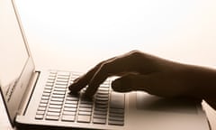 A woman's hands on a laptop keyboard.  Dominic Lipinski/PA Wire
