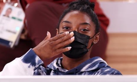 Gymnastics - Artistic - Olympics: Day 5<br>TOKYO, JAPAN - JULY 28: Simone Biles of Team United States blows a kiss whilst watching the Men’s All-Around Final on day five of the Tokyo 2020 Olympic Games at Ariake Gymnastics Centre on July 28, 2021 in Tokyo, Japan. (Photo by Jamie Squire/Getty Images)