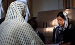 Azadeh Moaveni (right) interviews a woman in northeastern Nigeria.