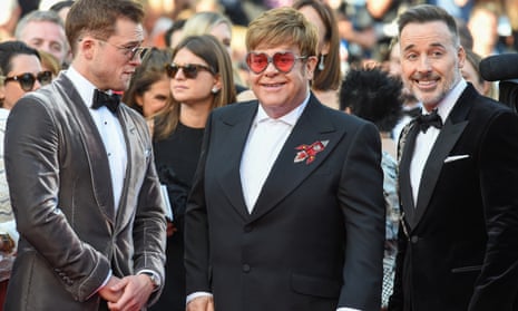 Elton John (centre) with Taron Egerton and David Furnish at the Cannes premiere of Rocketman.