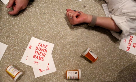 Protesters stage a ‘die-in’ as photographer Nan Goldin (not seen) and her organisation, Prescription Addiction Intervention Now (Pain) lead a protest at the Solomon R Guggenheim Museum in New York.