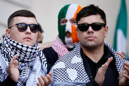 Kneecap’s Liam O’Hanna AKA Mo Chara, JJ O’Dochartaigh AKA DJ Provai and Naoise O Caireallain AKA Moglai Bap outside Westminster Magistrates Court earlier this month.