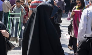 Covered woman wearing chador and hijab downtown Tehran. 2994.jpg?w=300&q=55&auto=format&usm=12&f