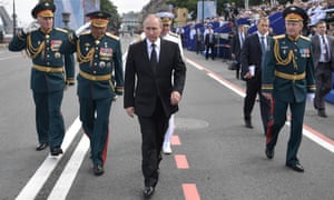 Vladimir Putin at a Russian Navy Day parade In St Petersburg in July.