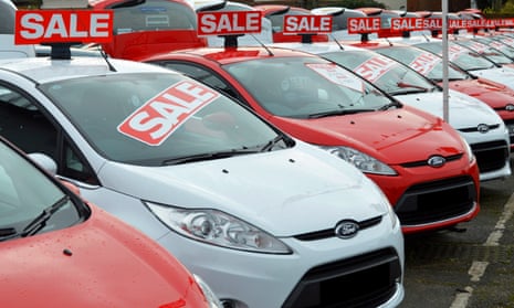 Cars awaiting buyers on a forecourt