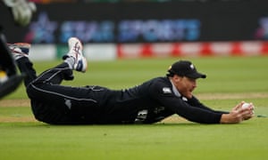 New Zealand’s Martin Guptill catches Pakistan’s Imam-ul-Haq.