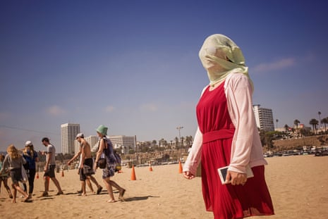 Woman on Santa Monica with veil over her face