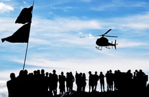 Silhouette of fans waiting on the roadside during stage nine