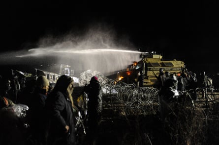 Police use a water cannon on protesters during a protest against plans to pass the Dakota Access pipeline near the Standing Rock Indian Reservation in North Dakota in 2016.